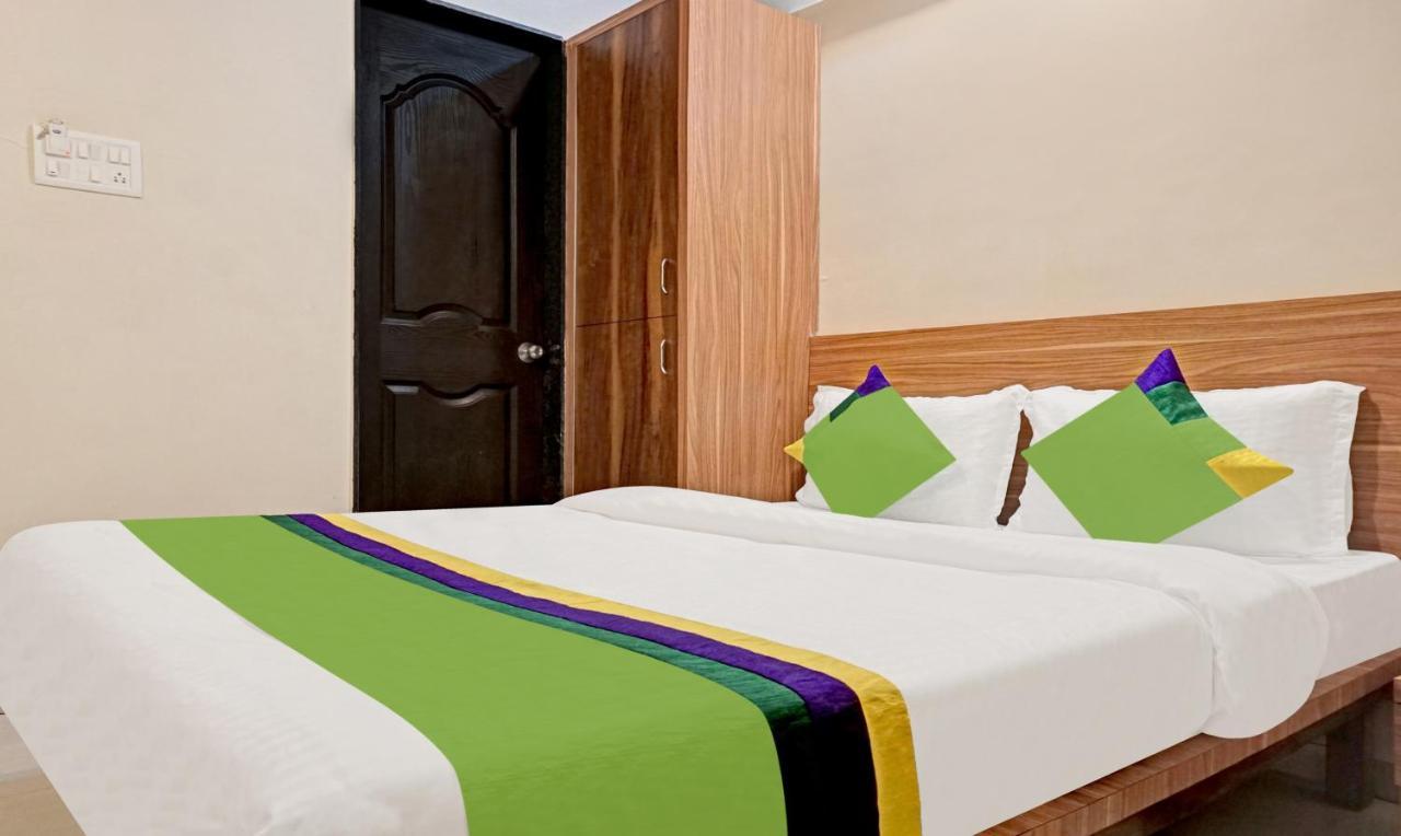 Treebo Trip Sai Krupa Hotel Poona Buitenkant foto