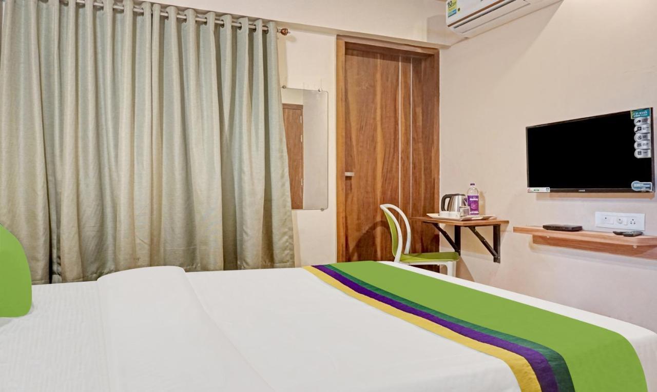 Treebo Trip Sai Krupa Hotel Poona Buitenkant foto