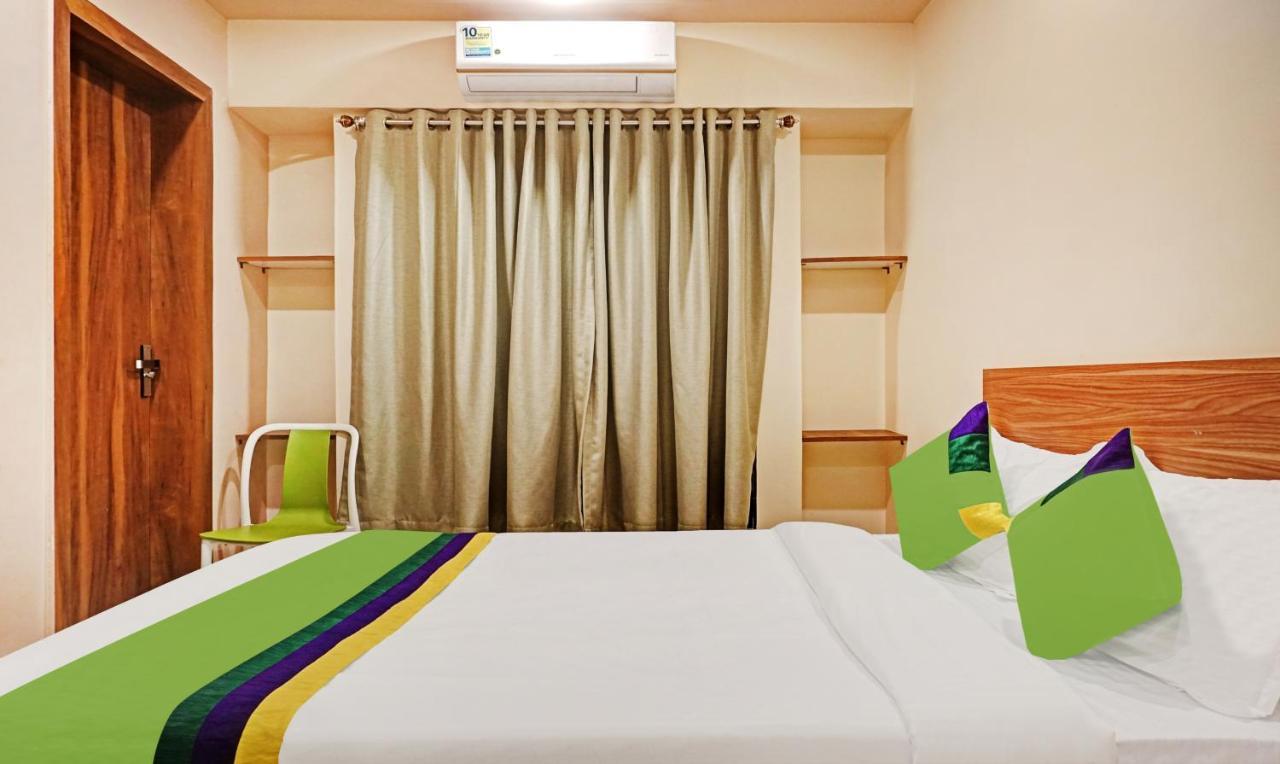 Treebo Trip Sai Krupa Hotel Poona Buitenkant foto