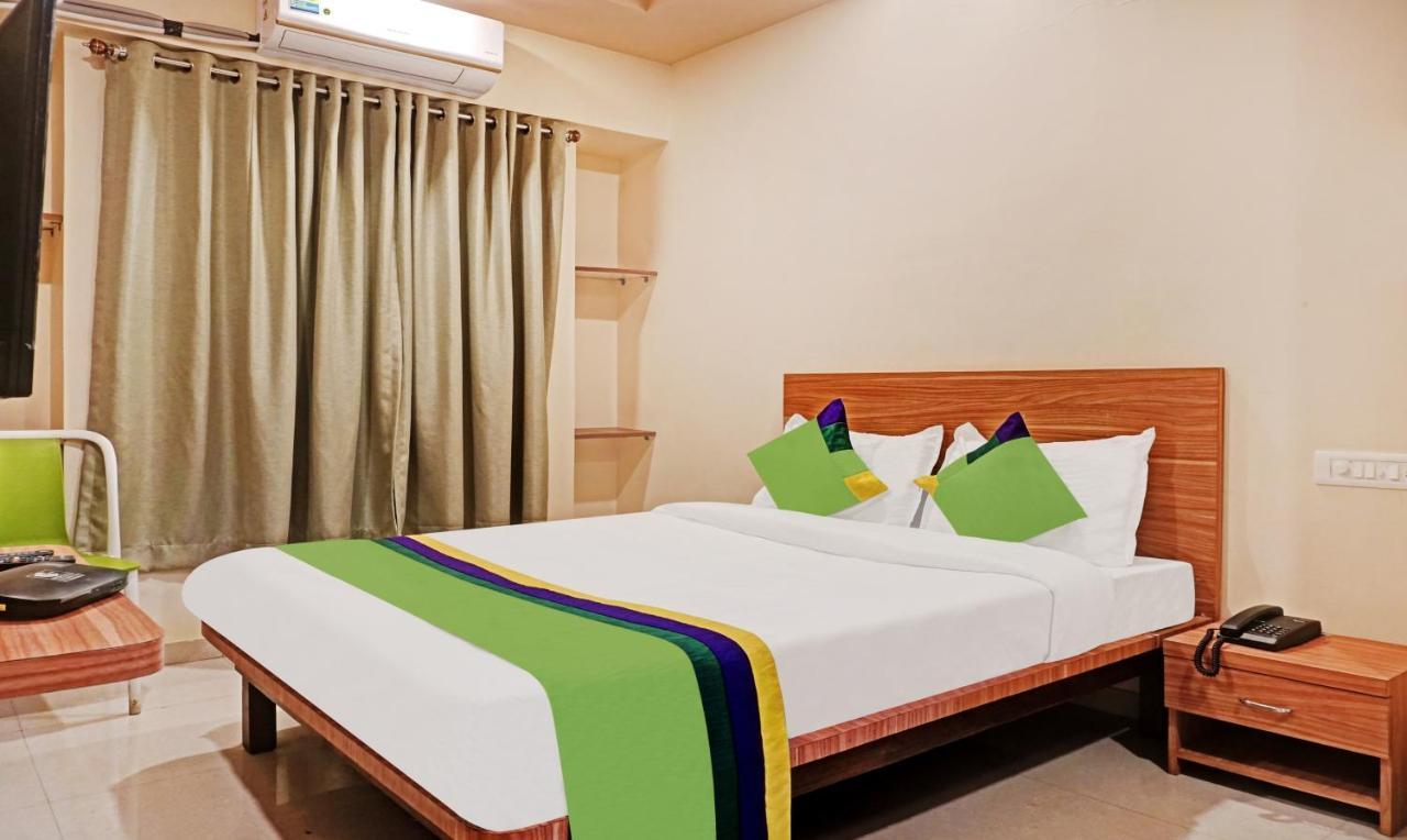 Treebo Trip Sai Krupa Hotel Poona Buitenkant foto