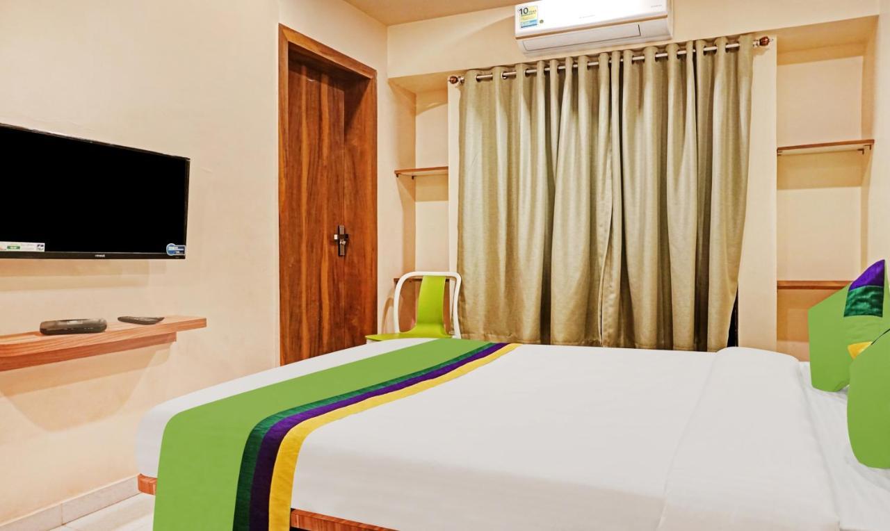 Treebo Trip Sai Krupa Hotel Poona Buitenkant foto