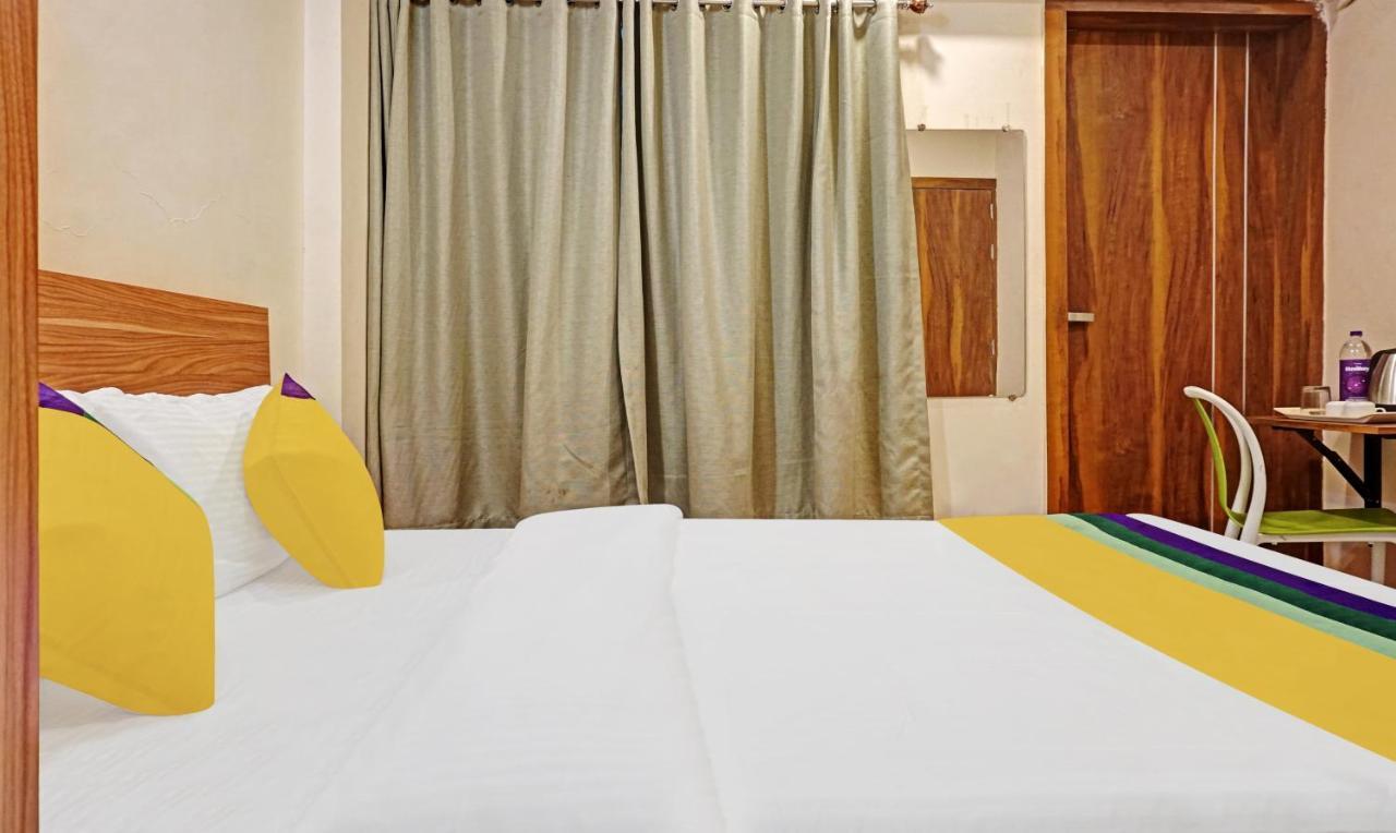 Treebo Trip Sai Krupa Hotel Poona Buitenkant foto