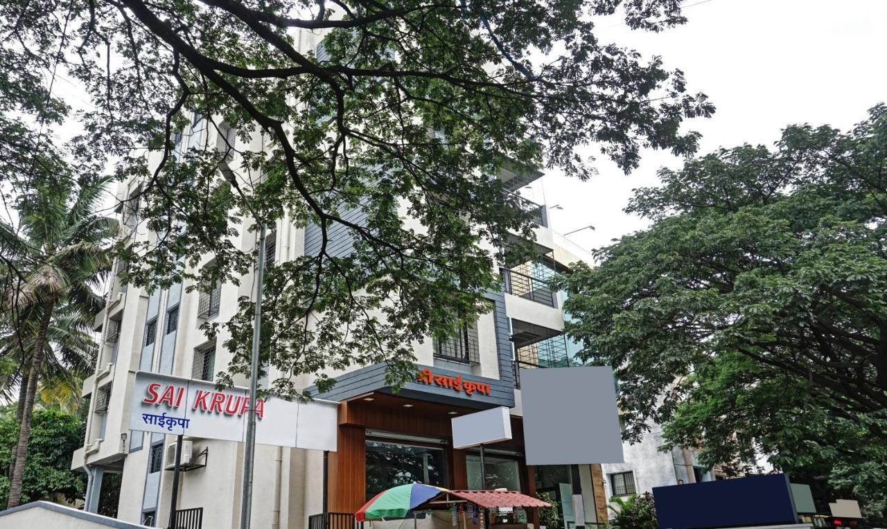 Treebo Trip Sai Krupa Hotel Poona Buitenkant foto