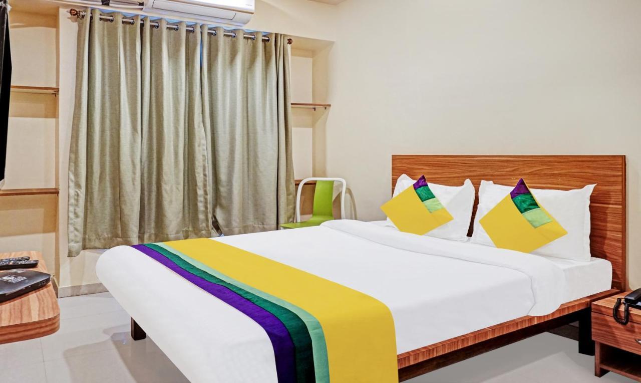 Treebo Trip Sai Krupa Hotel Poona Buitenkant foto